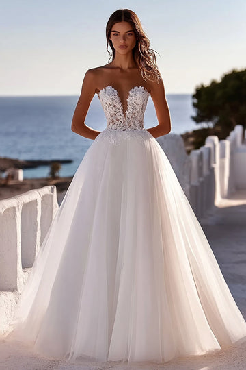 Robe de mariée sans bretelles en tulle ivoire